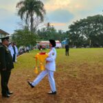 Kapolsek Gunungguruh Iptu Didin Waslidin, Laksanakan Upacara Penurunan Bendera