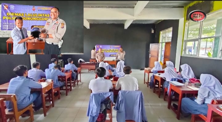 Kanit Lantas dan Kanit Binmas Polsek Gunungguruh Berikan Penyuluhan dan Bagikan Helm SNI di SMK Al Fathonah